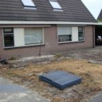 Koops-renovatie-voortuin-met-bloembakken-2